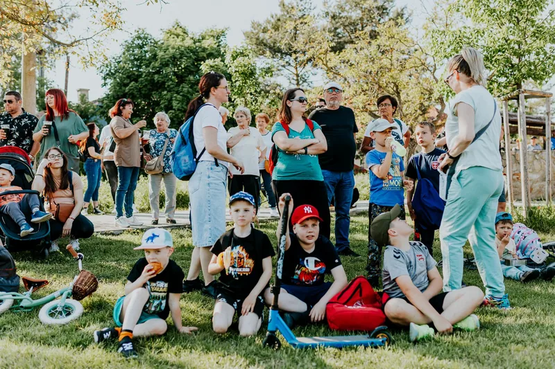 Parents and children gathered together at a family community event